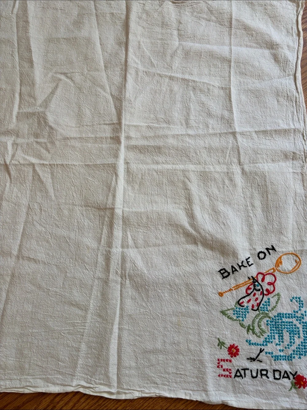 Embroidered 'Bake On Saturday' White Kitchen Tea Towel